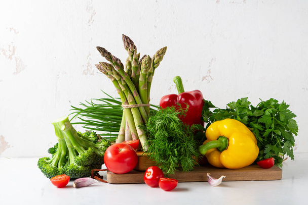 Variety organic produce on white table - 写真・画像