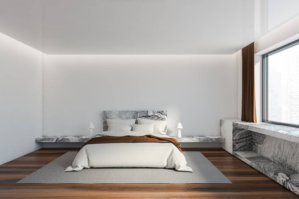 Interior of Scandinavian master bedroom with white walls, wooden floor, comfortable king size bed with white and brown bedding and marble shelf under window with blurry cityscape. 3d rendering - Photo, Image