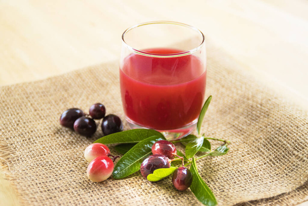 fresh Carissa carandas glass of juice with Carissa carandas fruits and Healthy drinks concept - Photo, Image