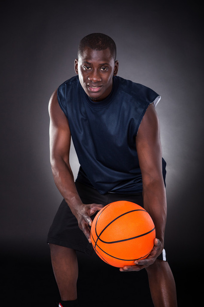 African Young Man With Basketball - Фото, изображение