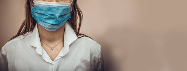 Doctor or nurse wearing protection face mask against coronavirus. Banner or panorama view for coronavirus or covid-19 ncov. Stay home and pray concept. High resulotion image. - Φωτογραφία, εικόνα