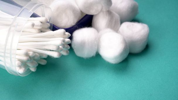 Cotton swabs, Cotton wool balls, on blue background. Free copy space. Hygiene concept. - Photo, Image