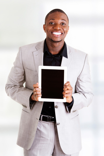 Businessman holding tablet computer - Fotoğraf, Görsel