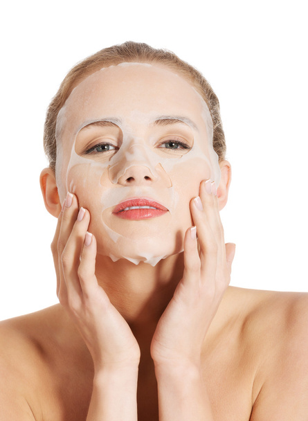 Beautiful woman with collagen mask on face. - Φωτογραφία, εικόνα
