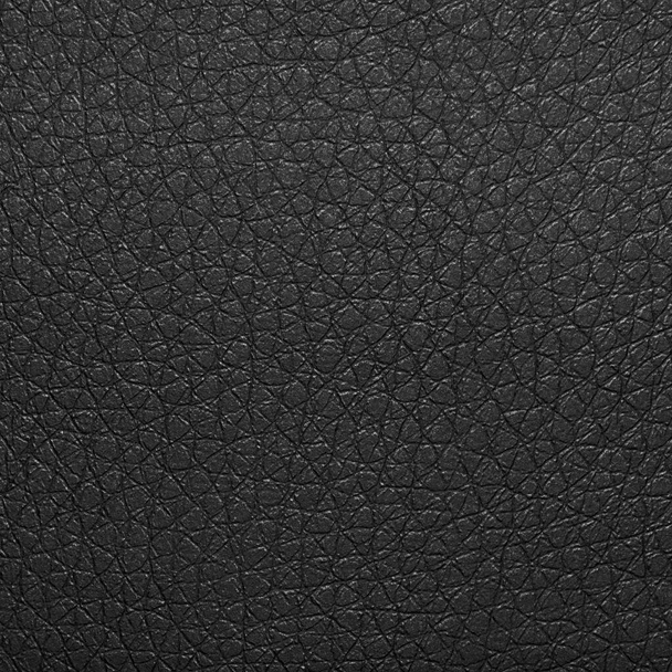 Black leather textured background.Texture-the smooth black leather. - Photo, Image