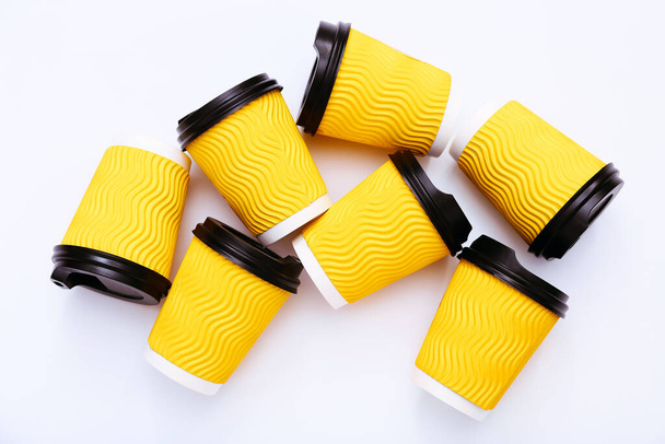 Corrugated paper disposable coffee cups with lid on white background. Packaging template mockup collection. - Photo, Image