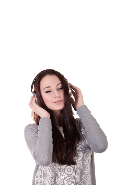 fiatal nő zenét hallgat - Fotó, kép