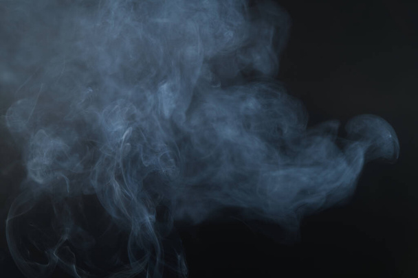 White smoke, black background, used as the background image. - Photo, Image