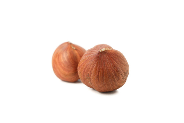 Tasty hazelnuts isolated on white background. Vitamin food - Photo, Image