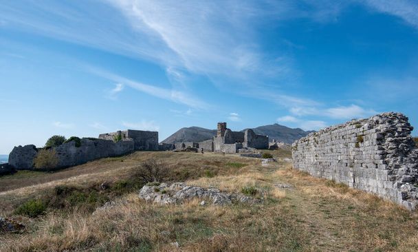 Ruins of Rozafa Castle and fortress , St. Stephan Church, Shkoder , Albania. surrounded by the Buna and Drin rivers. oldest and most historic town, as well as an important cultural and economic center - Photo, Image