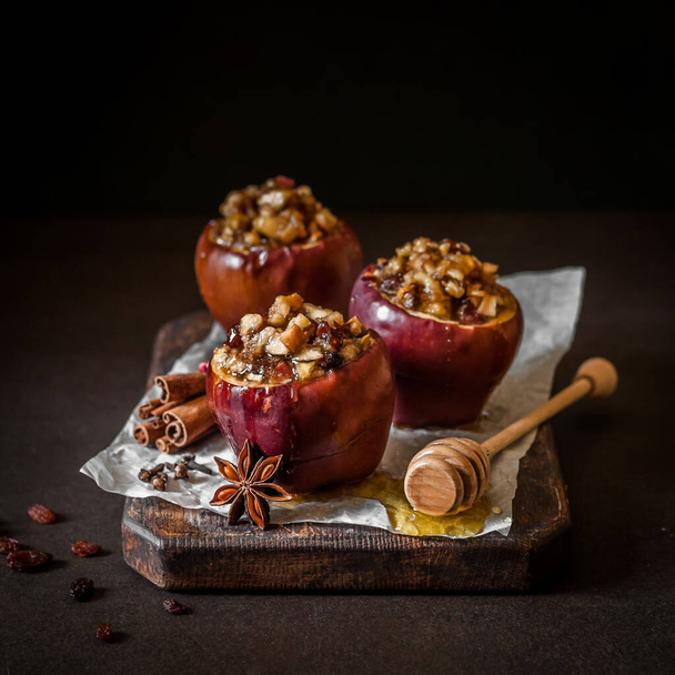 Baked Apples Stuffed with Walnuts and Sultanas, square - Zdjęcie, obraz