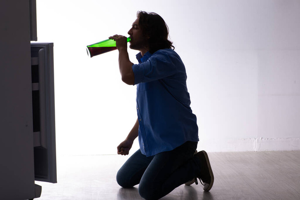 Young man suffering from alcoholism - Zdjęcie, obraz