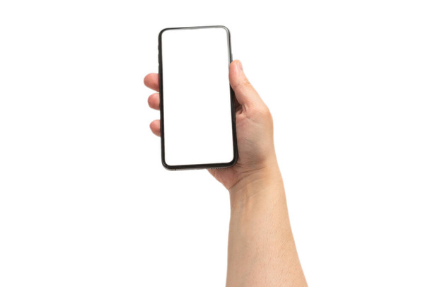 Смартфон в руці людини ізольований на білому тлі. Білий екран. Копіювати простір
. - Фото, зображення