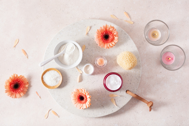 skincare products and daisy flowers. natural cosmetics for home spa treatment - 写真・画像