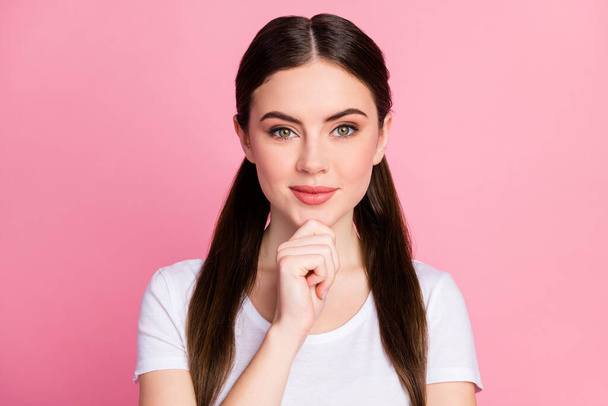 Close-up portrait of her she nice-looking attractive lovely winsome cute content smart clever brainy girl touching chin overthinking isolated over pink pastel color background - Fotó, kép