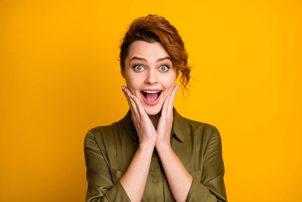Close-up portrait of her she nice-looking attractive lovely pretty charming glad excited cheerful cheery girl good news luck reaction isolated over bright vivid shine vibrant yellow color background - Fotoğraf, Görsel