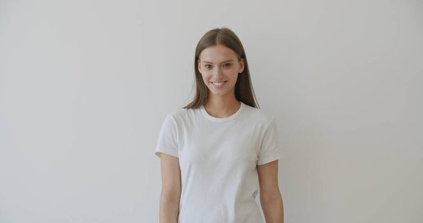 girl wearing only white blank copy space T-shirt - Foto, imagen