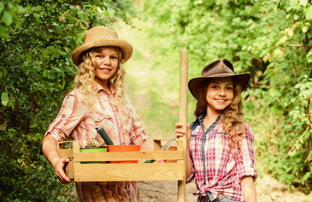 Gardening basics. Gardening teaching life cycle process. Summer at countryside. Kids girls with tools for gardening. Gardens great place cultivate meaningful and fun learning experience for children - Photo, Image