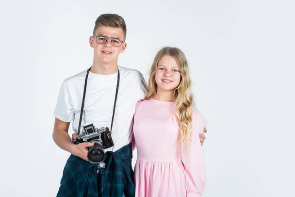 vintage camera technology. shooting with professional camera. photographing is their hobby. teen children with retro photo camera. talented photographer kids. faculty of journalism student - Zdjęcie, obraz