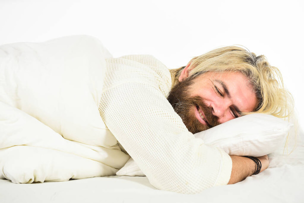 Mental health. Practice relaxing bedtime ritual. Man with sleepy face lay on pillow. Fast asleep concept. Man with beard relaxing. Having nap. Sweet dreams. Hipster with beard fall asleep. Good night - Foto, Bild
