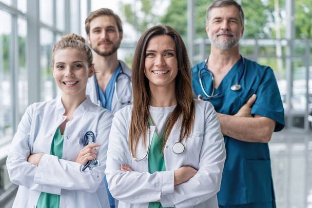 Group of medical staff smiling at the hospital. - Valokuva, kuva