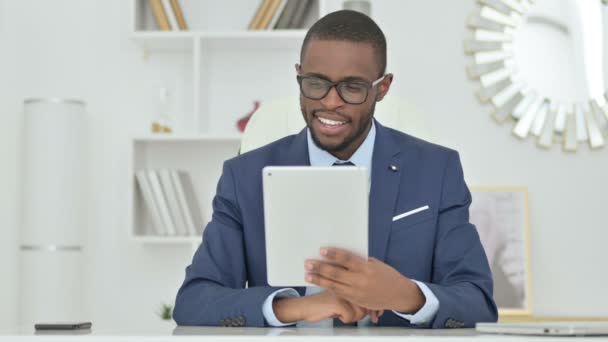 Portrait of Attractive African Businessman doing Video Call on Tablet  - Záběry, video