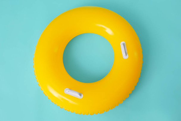 Inflatable ring on color background - Photo, Image