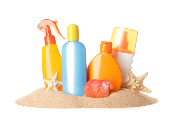 Bottles of sunscreen on white background - Zdjęcie, obraz