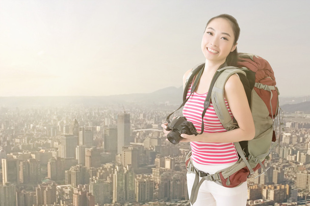 Smiling traveling Asian girl - Photo, Image