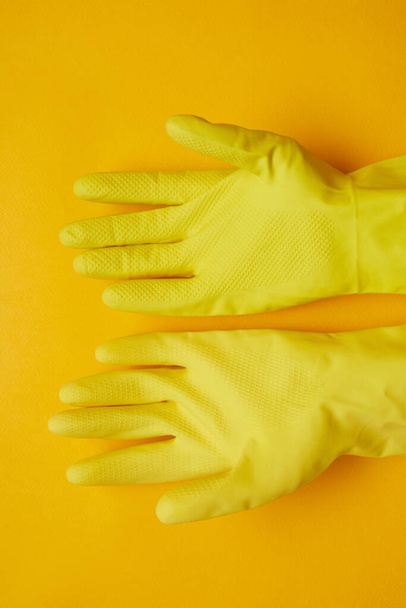 Yellow rubber gloves - Photo, Image