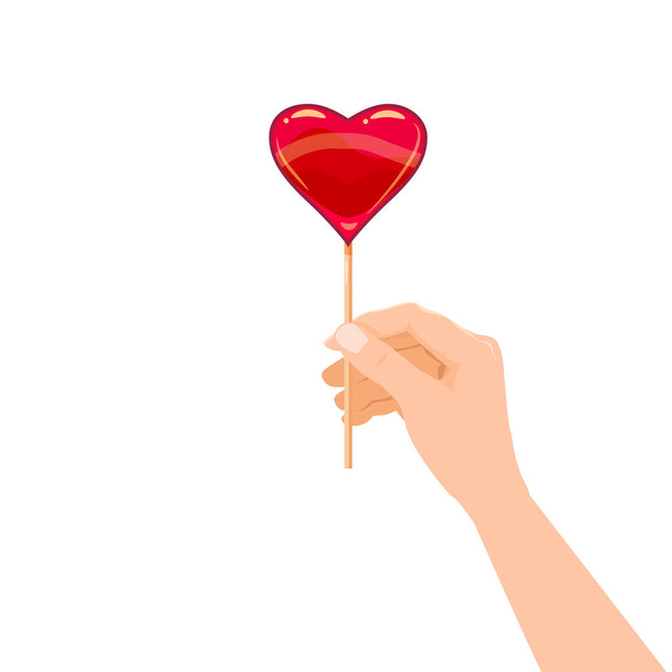 Hand houden snoep Lollipop in de vorm van een hart dessert zoetheid. Vector illustratie geïsoleerde cartoon stijl - Vector, afbeelding