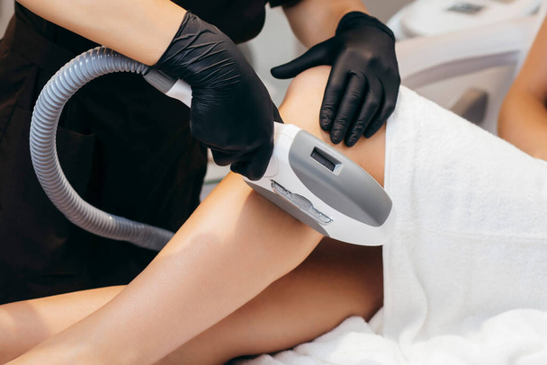 Hair removal cosmetology procedure. Laser epilation and cosmetology. - Photo, Image