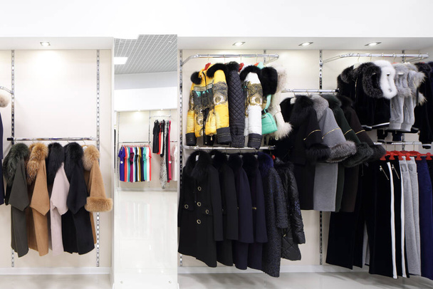 luxury and fashionable brand new interior of cloth store - Photo, image