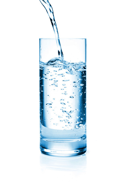 Fresh water pouring in a glass - Foto, afbeelding
