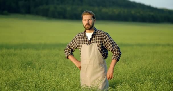 Portrait of farmer feeling happy because of organic plants. - Felvétel, videó