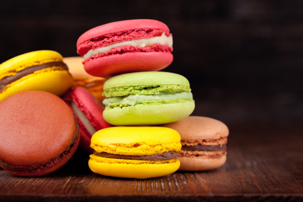 Macaroons on a wooden table - Photo, Image