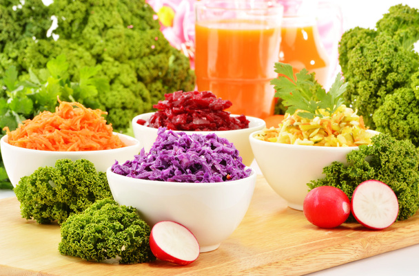 Композиція з чотирма овочевими салатними мисками
 - Фото, зображення