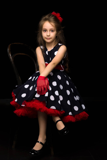 Portrait of Coquettish Girl Posing on Isolated Black Background - Zdjęcie, obraz