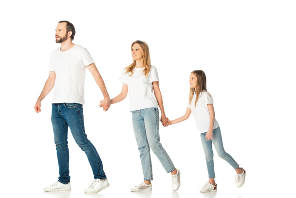 happy casual family holding hands isolated on white - 写真・画像