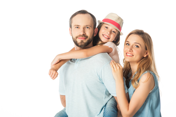 happy smiling family embracing isolated on white - Фото, зображення