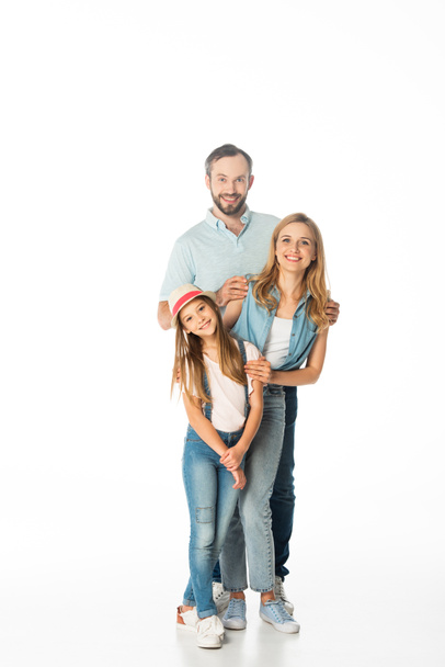 happy family smiling at camera isolated on white - Foto, afbeelding