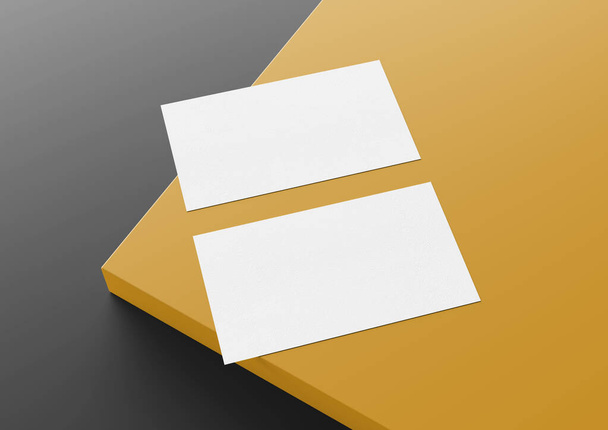 Two white US business card Mockup laying on yellow and grey background. American size calling card front and back laying on colored surface 3D rendering - 写真・画像