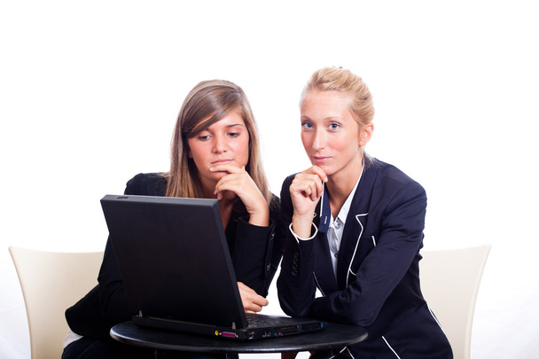 Two Young Businesswoman with Laptop - 写真・画像