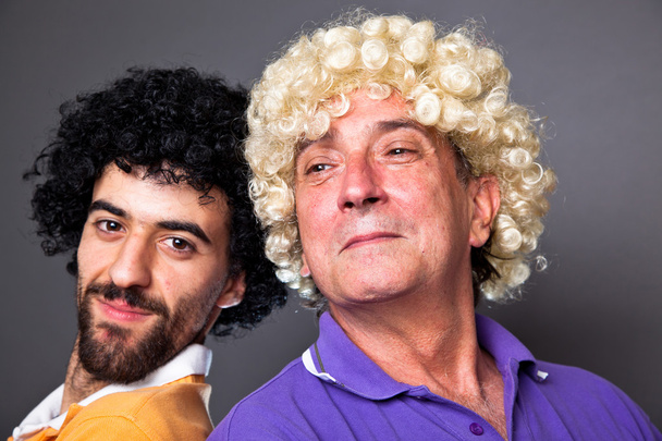 Young and Senior Man with Wig Making a Face - Photo, Image