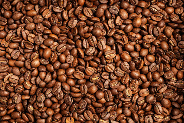 Grãos de café de fundo. Padrão de grãos de café torrado marrom. - Foto, Imagem