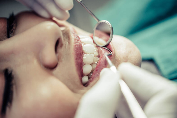 Dentists treat patients' teeth. - Photo, Image