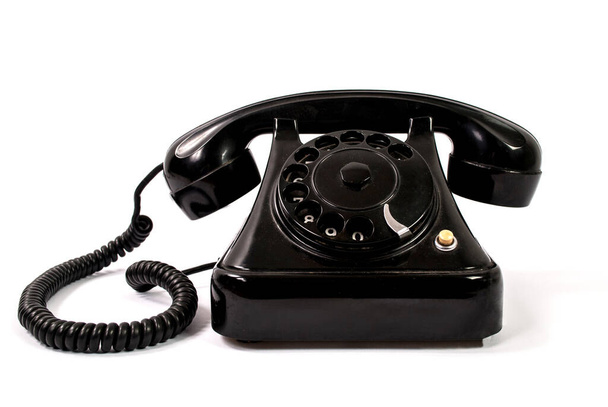 Régi fekete telefon elszigetelt fehér háttér - Fotó, kép