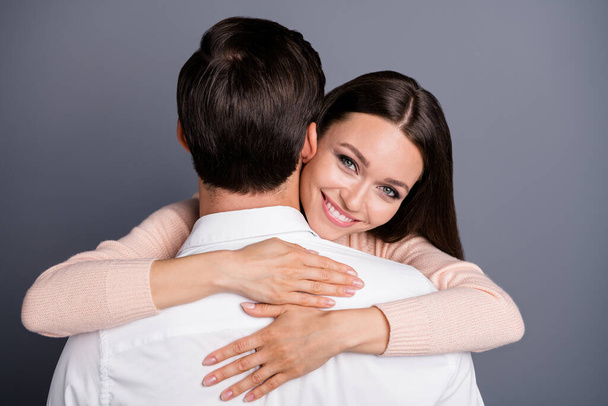 Close-up rear back behind view portrait of his he her she nice attractive lovely careful cheerful cheery gentle sweet couple embracing cuddling isolated over gray violet pastel color background - Photo, Image