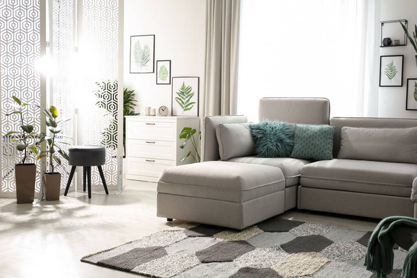 Comfortable large sofa in light room. Interior design - Foto, immagini