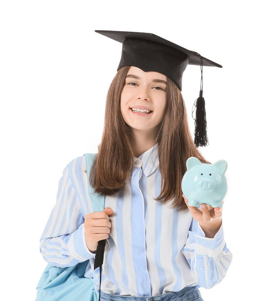 Девочка-подросток со сбережениями на образование на белом фоне - Фото, изображение